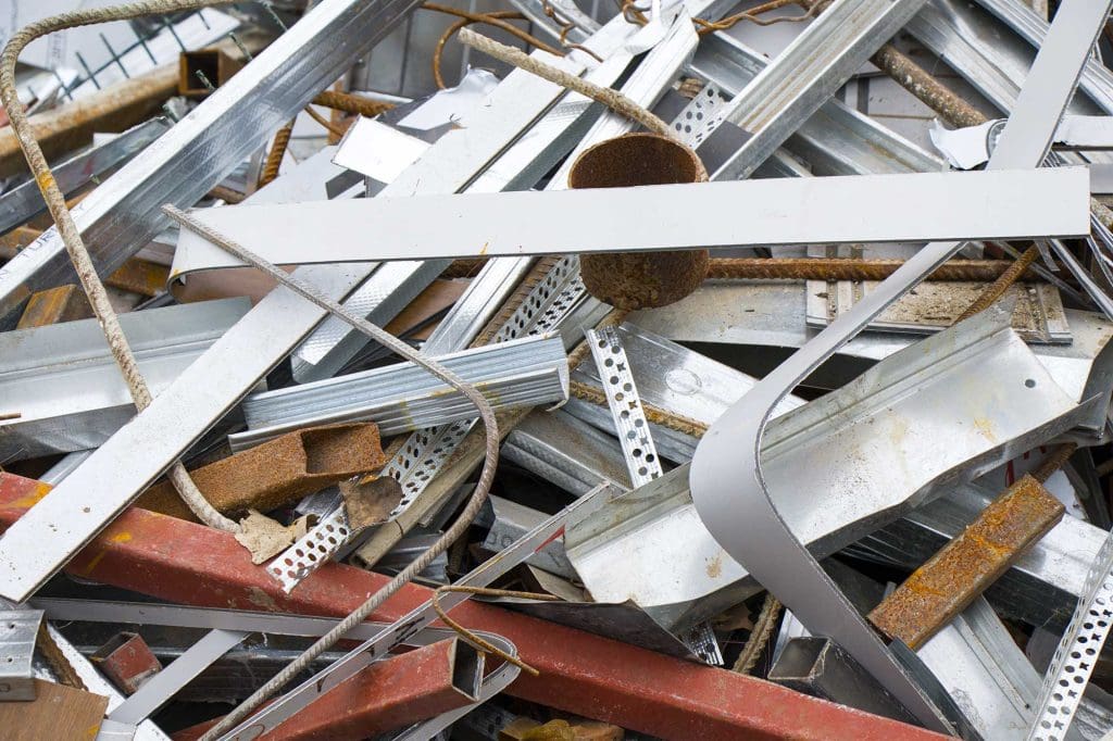 Close-up of a pile of old metal scrap ready for removal by Darren’s Towing in Townsville.